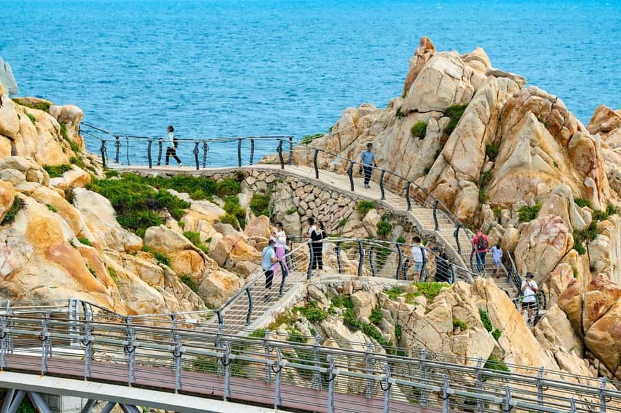 Busan: 7 Highlights Gyeongju City One Day Tour - Daewangam Suspension Bridge brings sea air to the morning