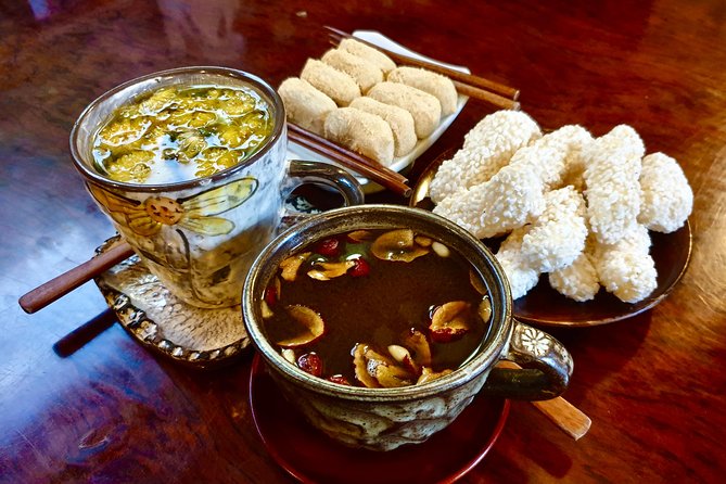 Downtown Seoul Guided Food & Market Tour with 8+ Local Tastings - Mandu, tteokbokki, and fish in broth