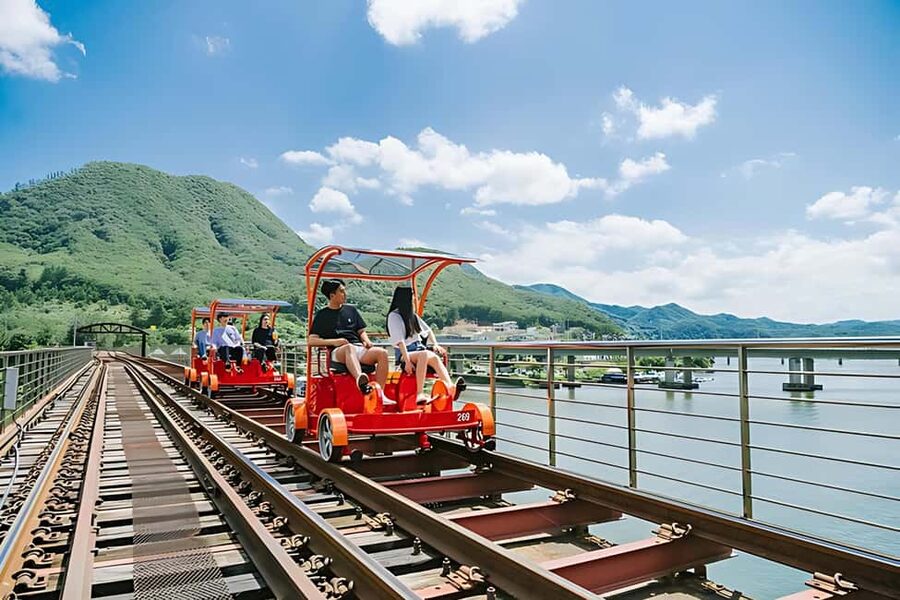 From Seoul: Nami Island, K-drama Garden & Rail Bike Day Tour - Gangchon Rail Bike is the most playful stop