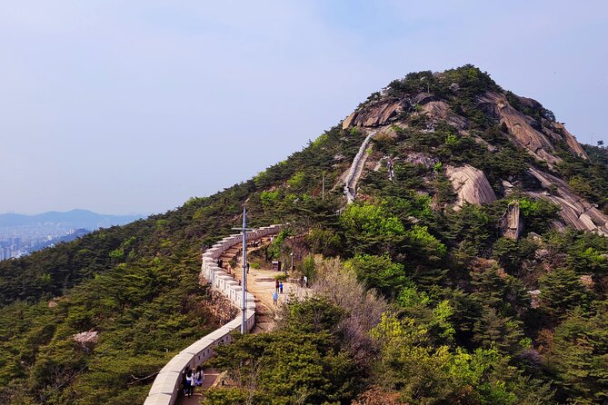 Inwangsan hike & historical sites - The summit view: N Seoul Tower, Lotte Tower, and the city at night