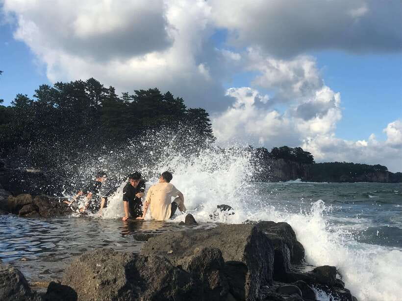Jeju: East of Jeju Island Bus Tour from Seogwipo City - Woljeong-ri Beach: a short pause with bright water