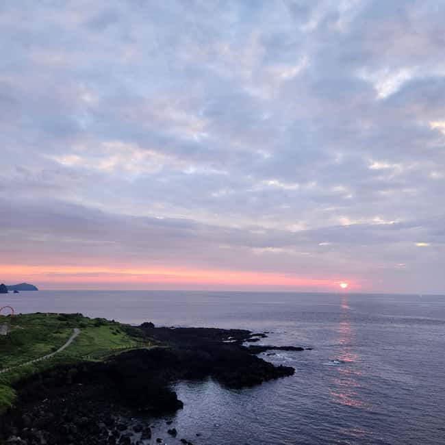 Jeju Island: Sunrise Guided Tour with Hotel Pickup - Leaving Jeju City before dawn