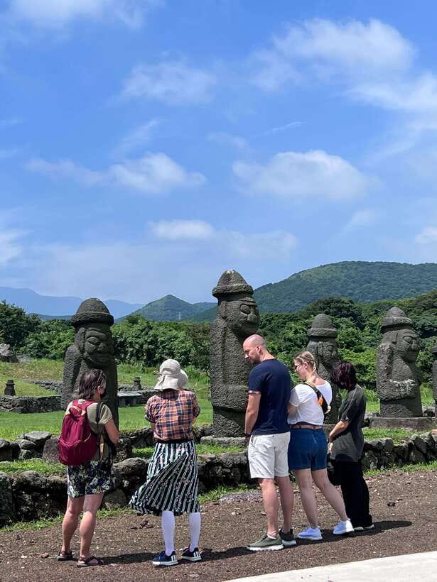 Jeju Island: Van Tour with a Guide Who Most Loves Jeju - Manjanggul Cave or Hamdeok Beach