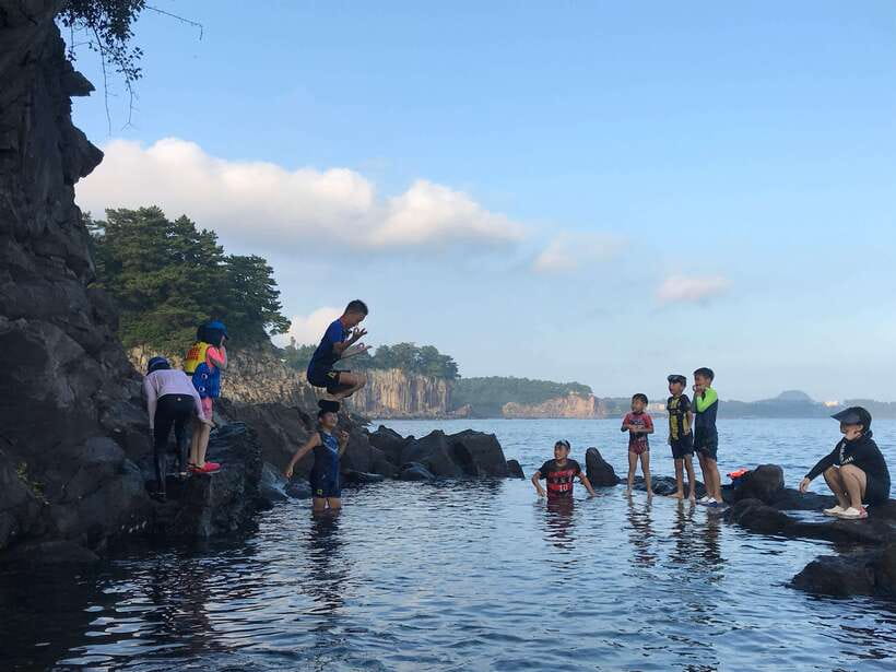 Jeju Island: Van Tour with a Guide Who Most Loves Jeju - Starting with Jeongbang Waterfall