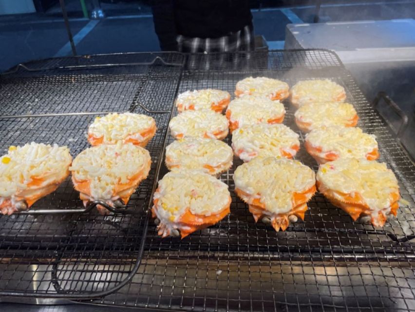 Jeju: Seogwipo City Walking Tours with Sunset - Eating your way through Maeil Olle Market