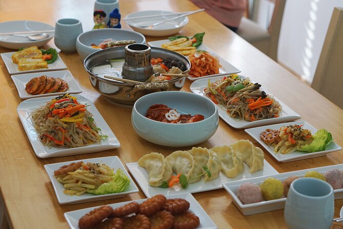 K-food cooking Japchae Mandu Tteokbokki & Fishcake - Four Korean dishes in one compact class