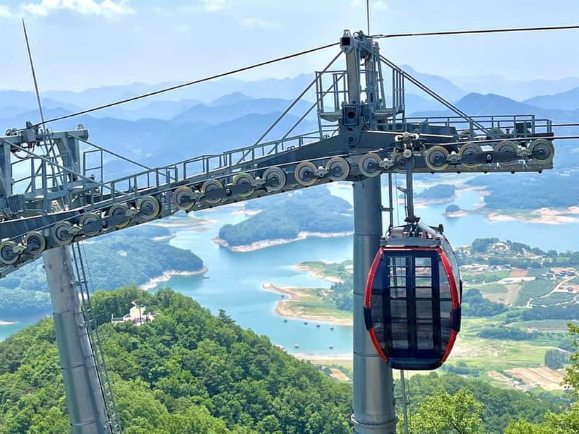 Seoul: Chungju Cruise, Cable Car & Cave Kayak Adventure Tour - A short cruise among wooded mountains
