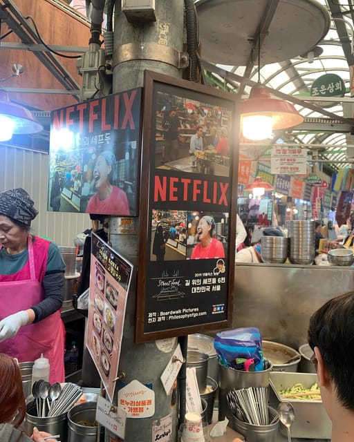 Seoul Gwangjang Market Foody Walking Tour - A short pause beside Cheonggyecheon Stream