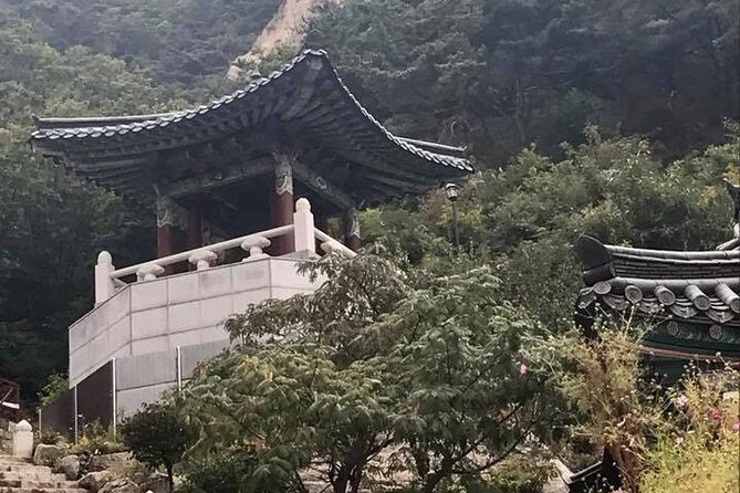 Seoul Mountain Hike: Temples, Folklore & Traditional Meal - Buddhist temples and shamanic places