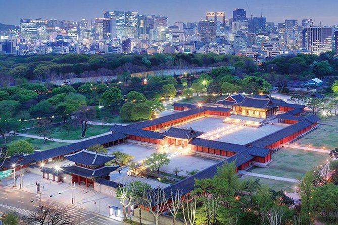 Seoul Night Tour (Gwangjang Market, Royal Palace and Naksan Park) - Cheonggyecheon Stream beneath the office towers