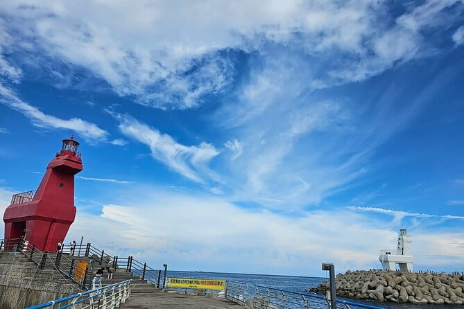 Small Group Tour in West Jeju Healing Island w/Caves & Dolphins - Hyeopjae Beach and the Biyangdo View
